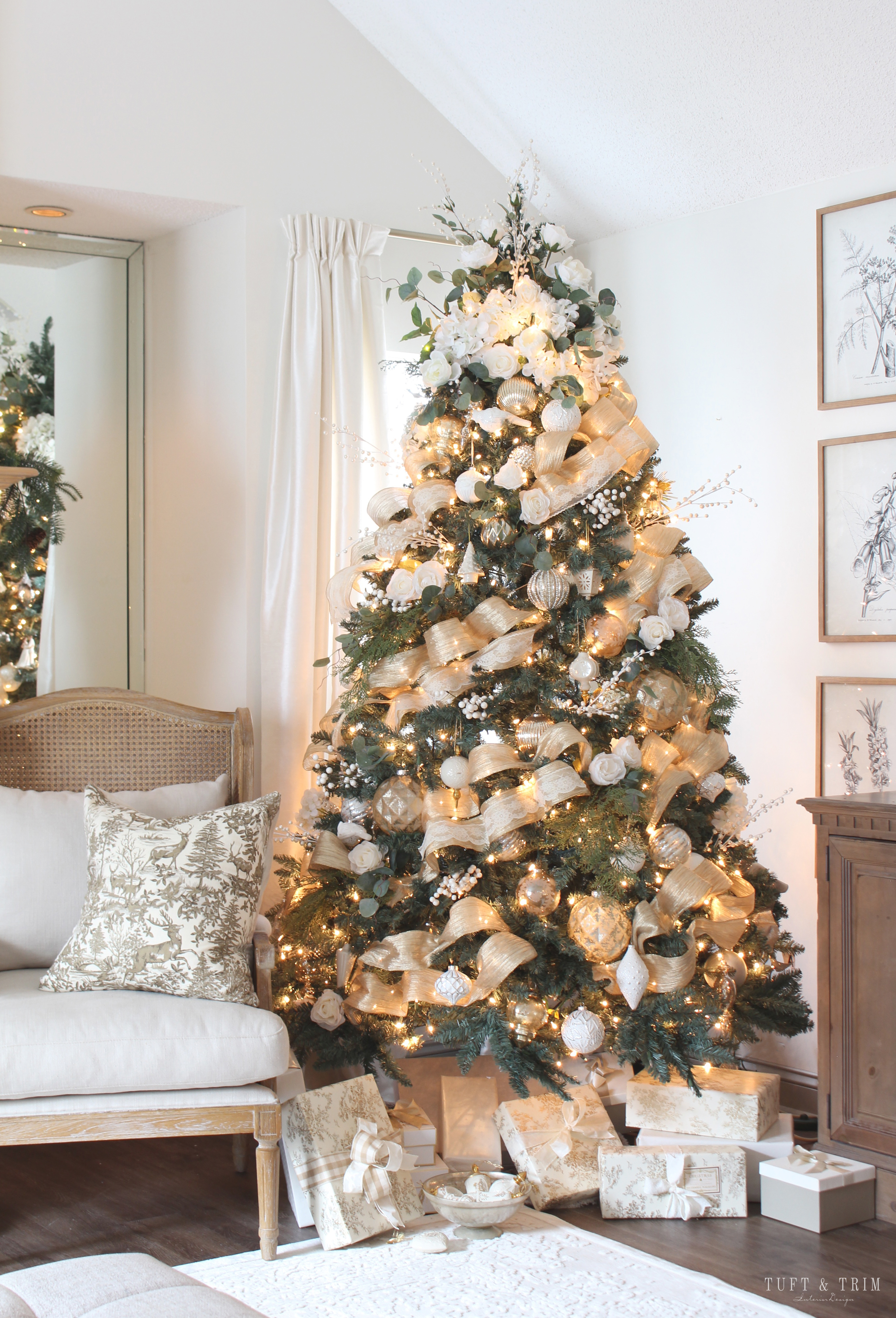 Elegant Christmas Tree with Floral and Gold by Tuft & Trim Interior Design